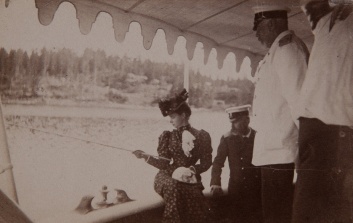Empress Maria Feodorovna fishing off the deck of the Imperial yacht ‘Tsarevna’, in the Finnish Skerries. 1894